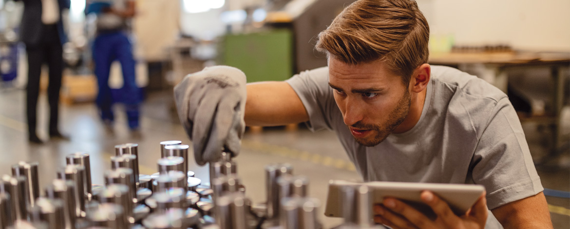 Man looking at machine